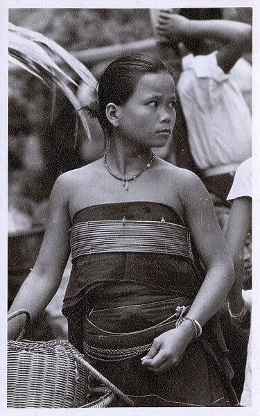 A girl of the Dusan People, Sabah State, North Borneo