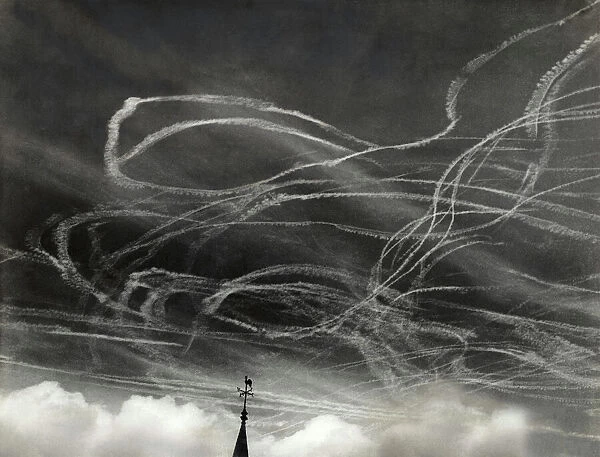 A Mass of White Contrails During a Battle-Of-Britain Dog?