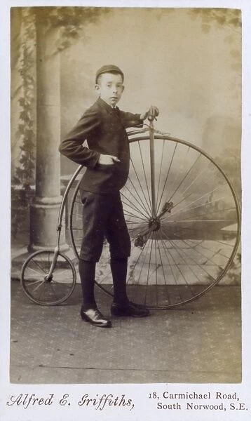 Young Boy with a Penny Farthing Bicycle