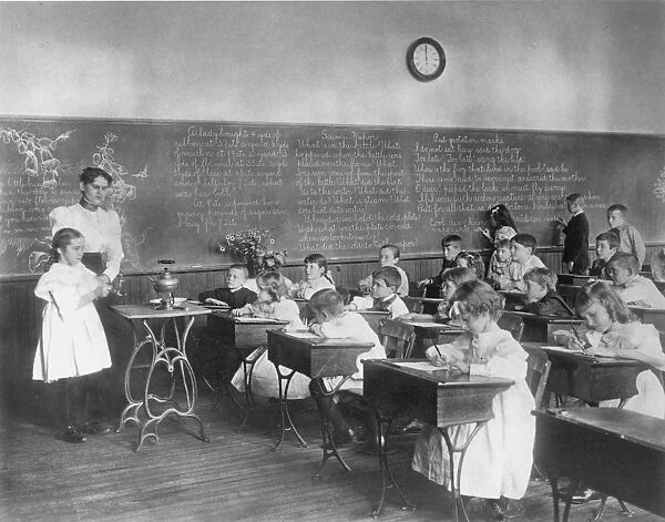 ELEMENTARY SCHOOL, 1899. A science class studying water vapor at the Second Division School