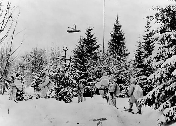 RUSSO-FINNISH WAR, 1939-40. A Finnish ski patrol watching for Soviet forces in