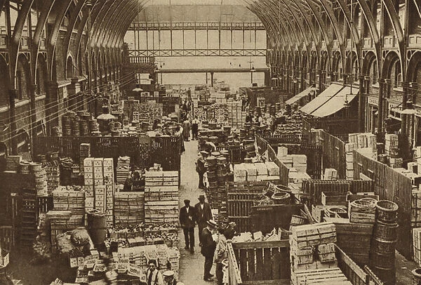 Stalls that display the products of many climes in the fruit depsartment at Covent Garden (b  /  w photo)
