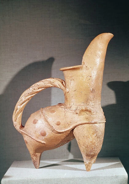 White pottery kuei tripod jug, from Weifang, Shandong, 3rd-2nd millennium BC