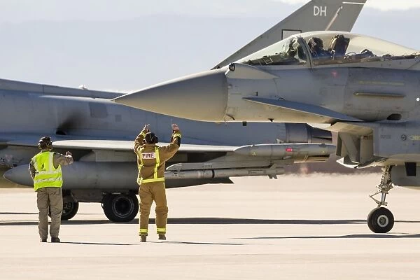 Final checks are made on a Royal Air Force Typhoon prior to takeoff