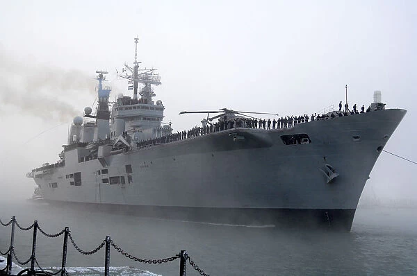 HMS Ark Royal Emerges from the Mist to Dock in Portsmouth for the Final Time