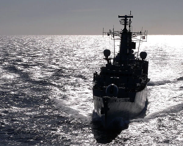 HMS Campbeltown silhouetted at sea enroute to Gibraltar in 2007