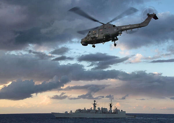 HMS Cumberlands Lynx Returns to Mother During Operation Ellamy