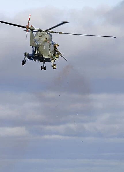HMS Edinburghs Lynx Helicopter Opens Fire with her. 50 Cal Machine Gun