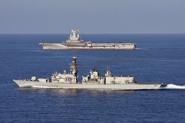 HMS Kent carries out manoeuvres with French Ship FS Charles De Gaulle