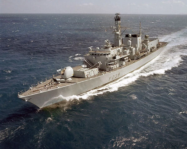 HMS Northumberland glides over the Great Barrier Reef, Australia