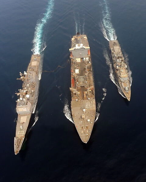 HMS St Albans and USS Philippine Sea Refuel from USNS Tippecanoe