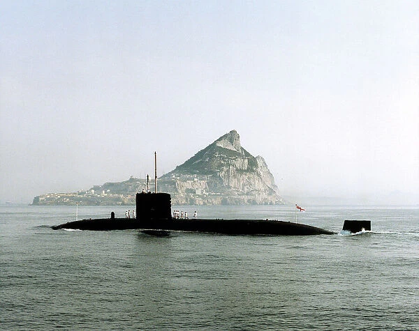HMS Superb is pictured with the Rock of Gibraltar in the background