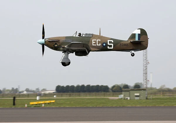 A Hurricane Mk IIC which forms part of the BBMF above RAF Conningsby