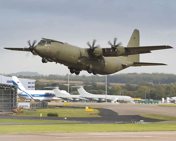 Image of a Hercules C130 aircraft, taking off from RAF Brize Norton