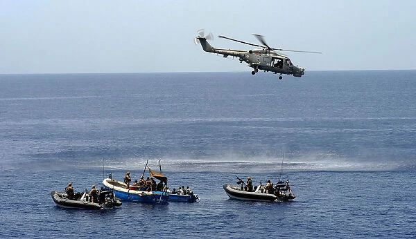Lynx Helicopter Hovers Over Suspected Pirates
