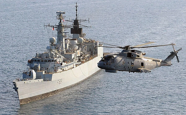 Merlin Flies over HMS Cumberland