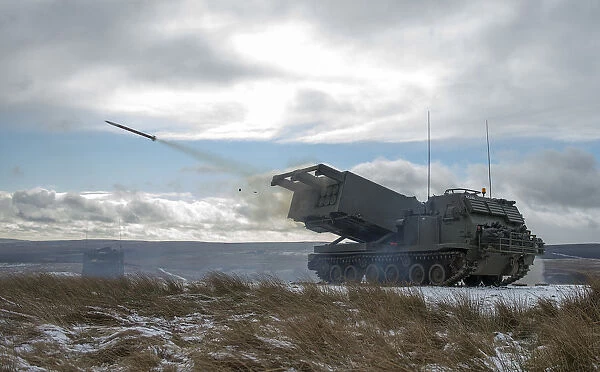 MLRS captured as a training round leaves the launch tube on the ranges at Otterburn