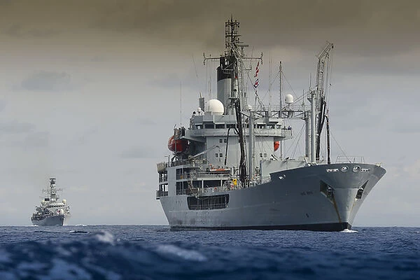Picture is RFA GOLD ROVER with HMS LANCASTER in the background, together on Atlantic Patrol Task