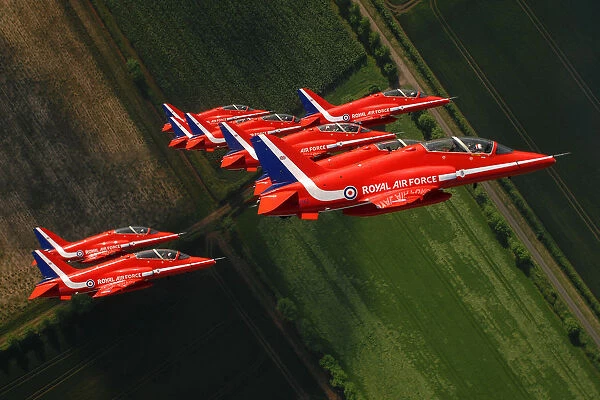 The Red Arrows are pictured as they fly in tight formation during display training