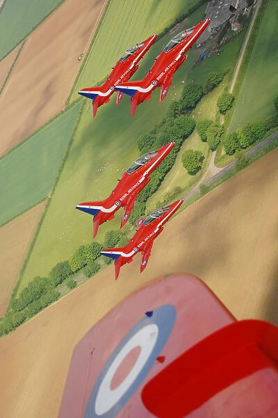 The Red Arrows practice a display over their home base of RAF Scampton in Lincolnshire