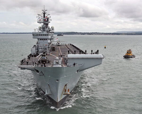 Royal Navy Aircraft Carrier HMS Illustrious Returns To Portsmouth Folllowing Refit