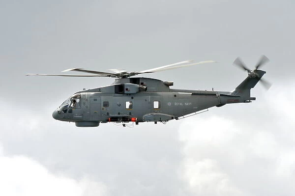 Royal Navy Merlin Helicopter Carrying a Training Torpedo
