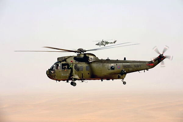 Royal Navy Sea King Mk4 Helicopter Escorted by Army Lynx Mk9A Over Afghanistan