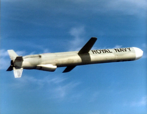 Tomahawk Land Attack Missile ( Cruise Missile) (TLAM) flying through the air. 12  /  04  /  2000
