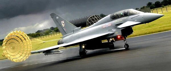 A Typhoon F2 fighter jet from 29 Squadron Royal Air Force deploys its braking parachute