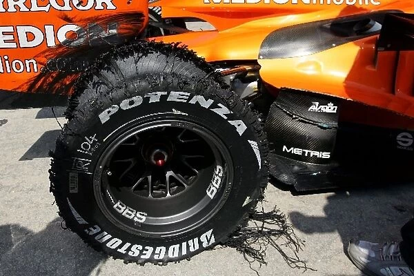 Formula One World Championship: The shredded rear Bridgestone tyre of Christian Albers Spyker F8-VII after he suffered a blowout