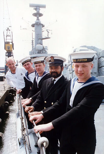 Five crew member of the HMS Jupiter, looking forward to shore leave in their home port as