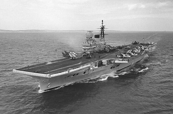 Royal Navy Aircraft Carrier HMS Victorious August 1959 steams through the Solent with
