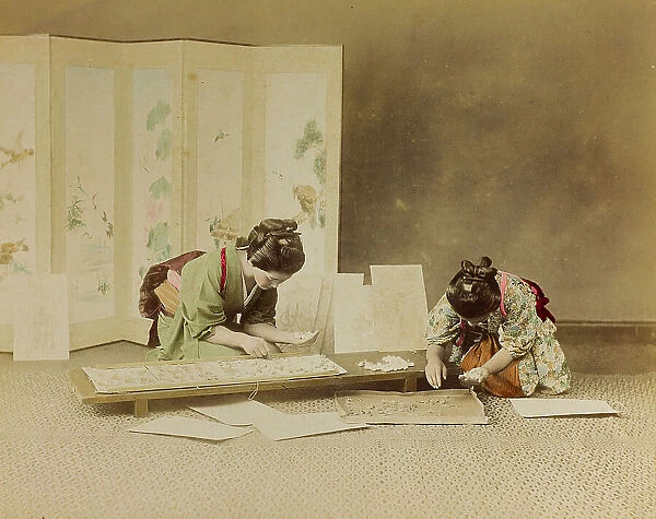 Album 'Von Herr August Egli in Jokohama - Juni 1895': two young Japanese women in traditional costume settle silkworms useful to the textile industry