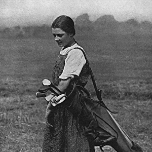Girl golf caddy, WW1