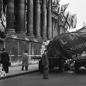 Lorry sheds its load, Trafalgar Square, London