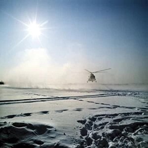 Helicopter landing on snow