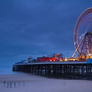 England, Lancashire, Blackpool. Blackpool Central Pier at dusk