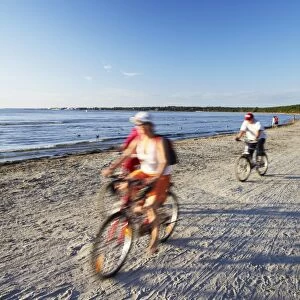 Cyclists on Pirita Beach, Tallinn, Estonia, Baltic States, Europe