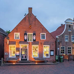 Cafe at Greetsiel in the evening light, Krummhorn, East Frisia, Lower Saxony, Germany