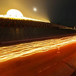 Buddhist monks pray at Wat Phra Dhammakaya temple during a ceremony on Makha Bucha Day in