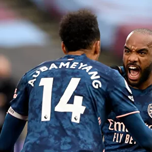 Alexandre Lacazette and Pierre-Emerick Aubameyang Celebrate Arsenal's Goals Against West Ham United in Premier League