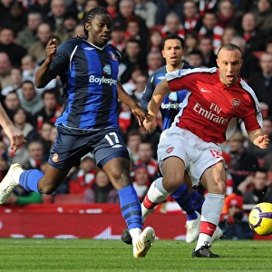 Mikael Silvestre (Arsenal) Kenwyne Jones (Sunderland). Arsenal 2: 0 Sunderland