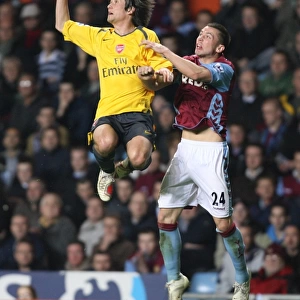 Tomas Rosicky (Arsenal) Phil Bardsley (Aston Villa)