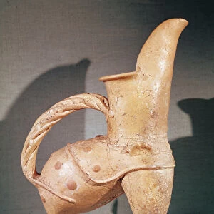 White pottery kuei tripod jug, from Weifang, Shandong, 3rd-2nd millennium BC