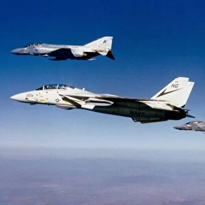 An F-14 Tomcat and two F-4 Phantom IIs during a training flight