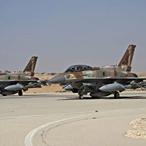 Two F-16I Sufa aircraft of the Israeli Air Force taxiing on the runway