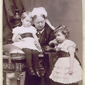 Queen Victoria with two of her grandchildren, April 1886. Artist: Alexander Bassano