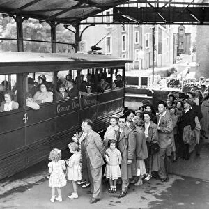 Holidaymakers queue for the Great Orme Tramway 1950