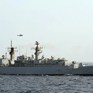HMS Cumberland Is Photographed After Passing HMS Cornwall During Anti-Piracy Operations