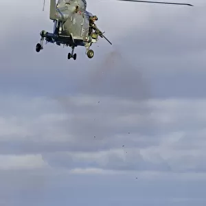 HMS Edinburghs Lynx Helicopter Opens Fire with her. 50 Cal Machine Gun